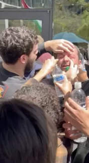 Treating Imam Taha for effects of chemical weapon, Image credit: Anonymous